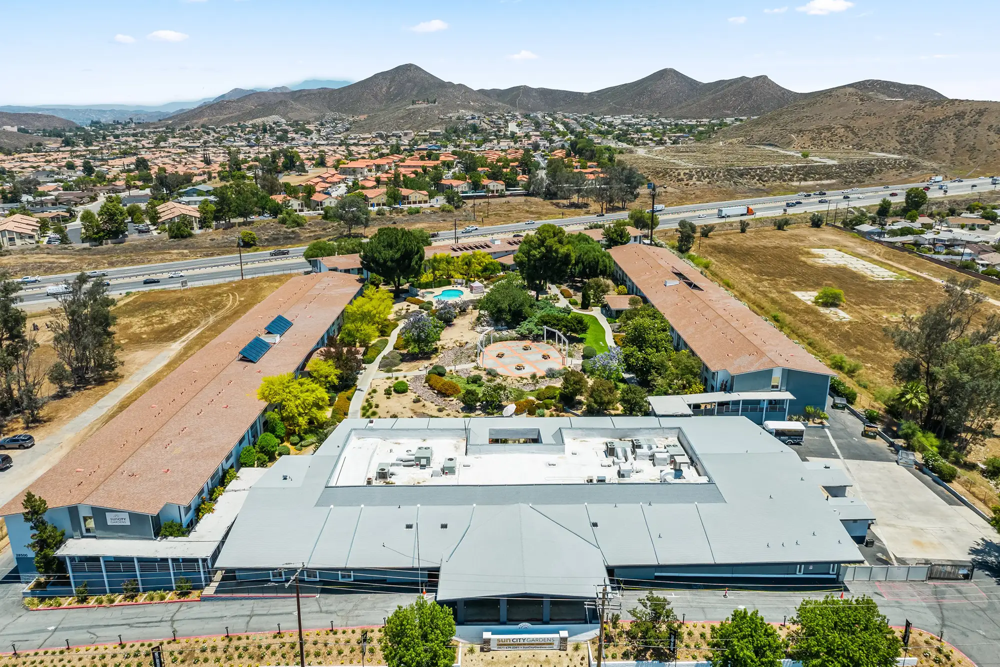 PSLSunCityGardens-ABOUT-Neighborhood Beautiful view of the mountains near Meridian San Marcos